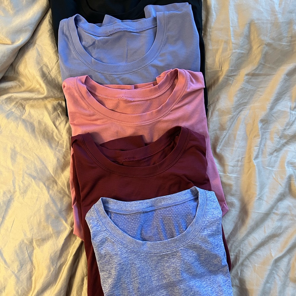 Set of Five relaxed swiftly shirts.